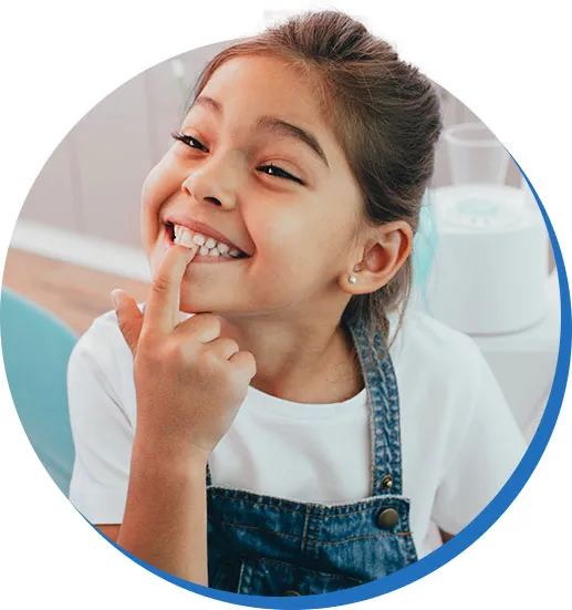 Child smiling at dental appointment